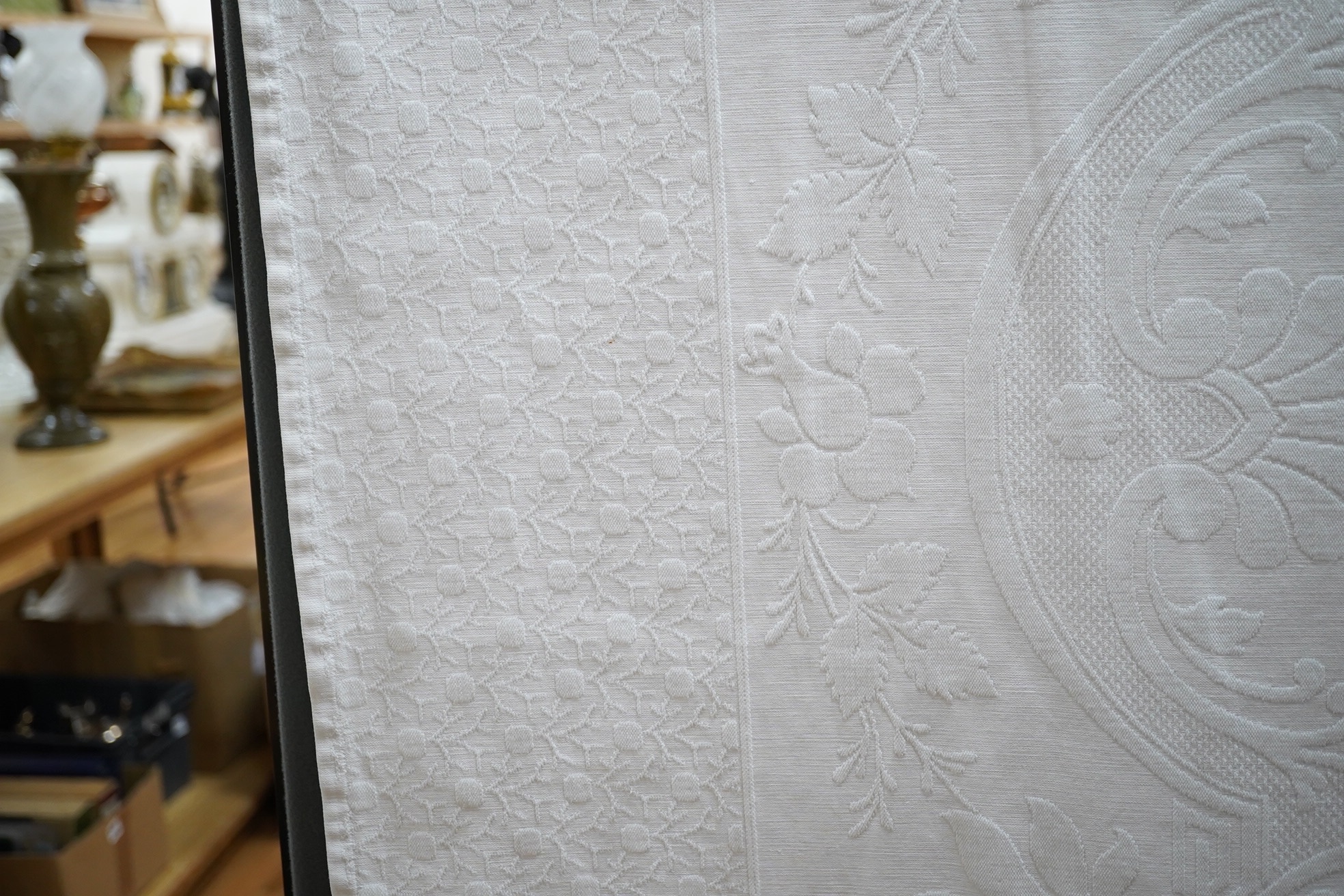 Three late 19th century white linen ‘Marcella’ style bedcovers, with inspired Christopher Dresser floral textile designs.